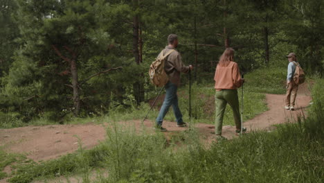 family hiking in forest