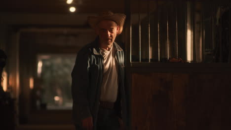 man in a stable