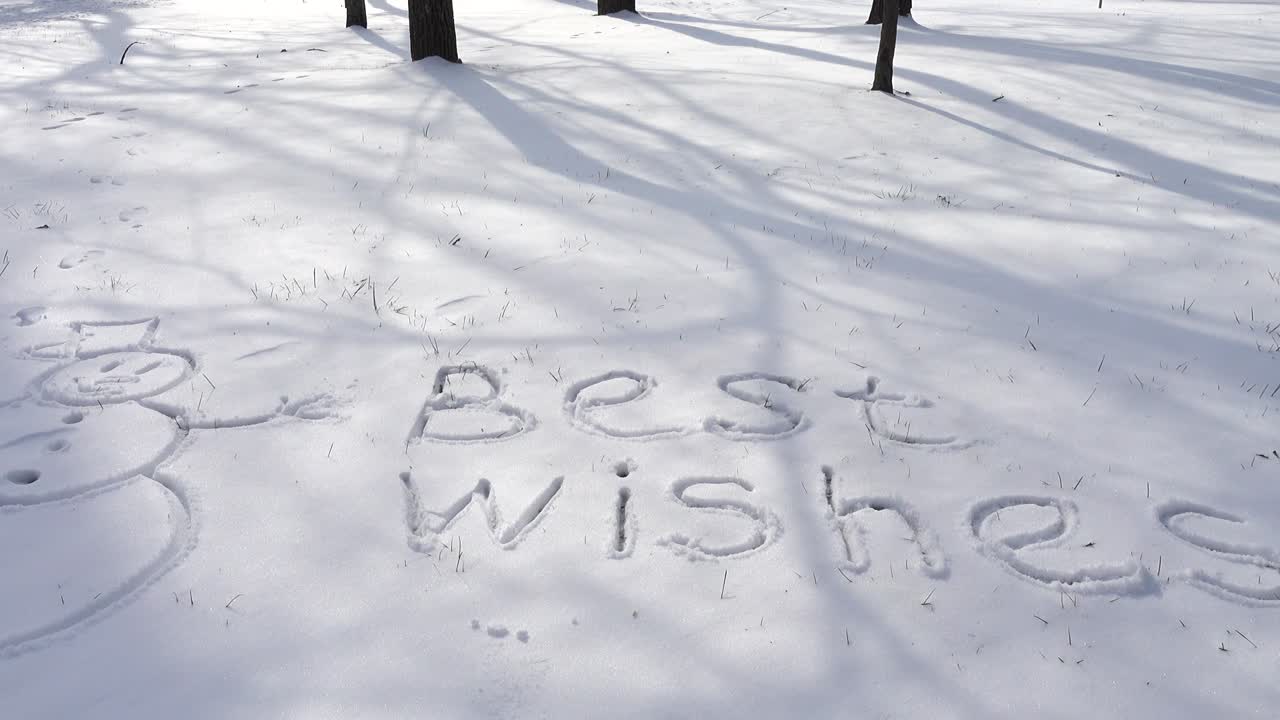 雪の上の「Best Wishes」の文字。冬の撮影。