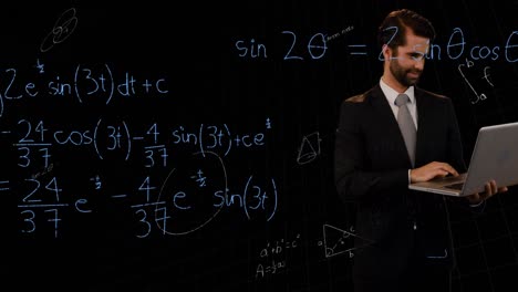 Mathematical-equations-floating-against-caucasian-businessman-using-laptop-against-black-background