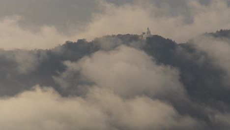 misty mountain landscape with temple