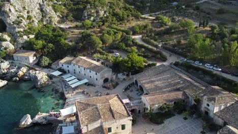 Waterfront-Building-Of-The-Tonnara-of-Scopello-An-Open-Air-Museum-In-Scopello,-Trapani,-Italy