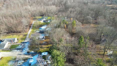 Aerial-shot-of-a-drone-pov-landing-in-a-residential-neighborhood