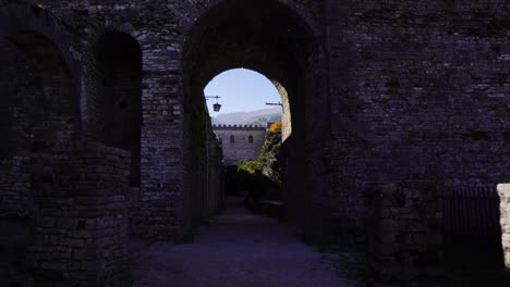 Castle-walls-with-carved-stones-and-arches-inside-fortification-in-Gjirkaster,-Albania