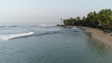 flying along dalawella beach at sunrise, beautiful undiscovered travel destination