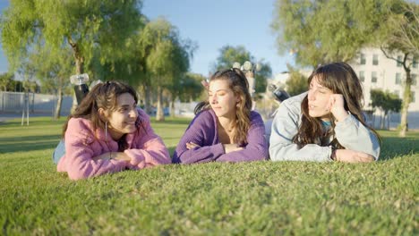 three friends relaxing in the park