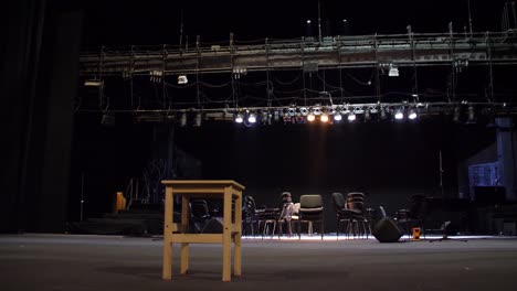 empty theater stage with lighting and equipment