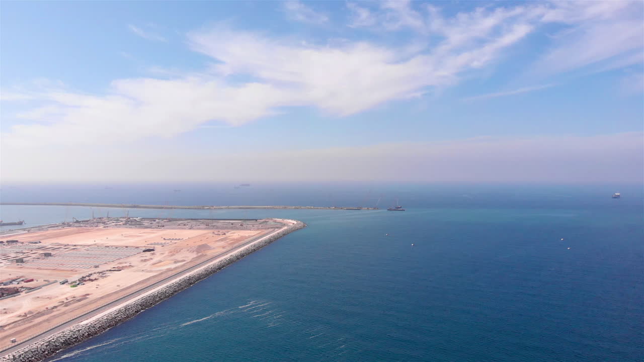 Aerial footage over Ashdod Exiting and entering port for Cargos