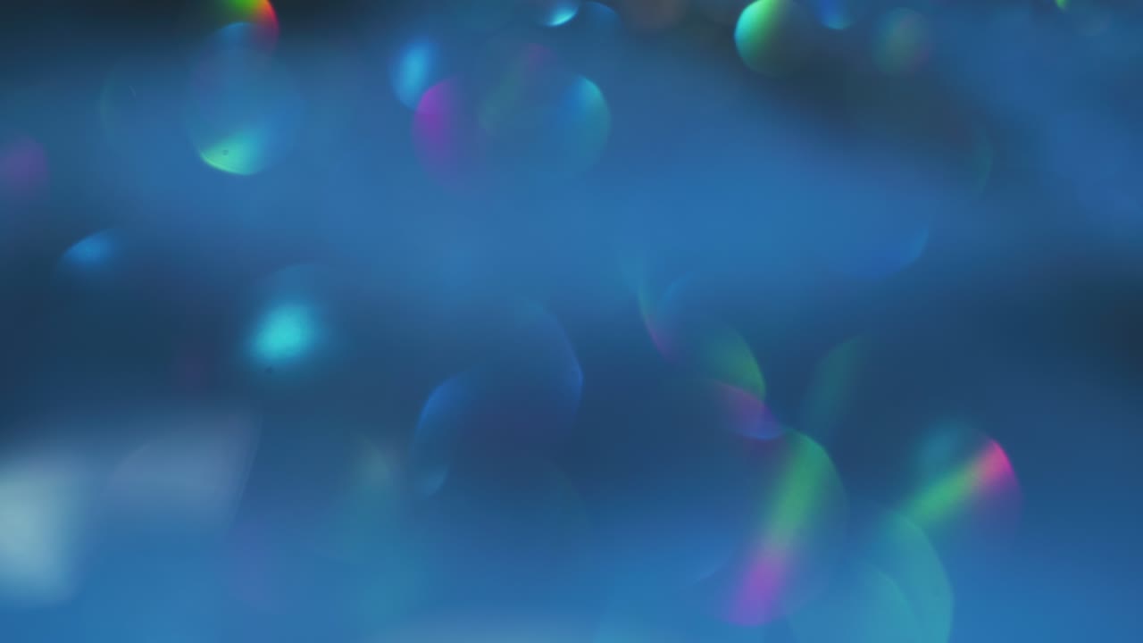 bokeh resplandor luz llamarada superposición círculos de neón flujo