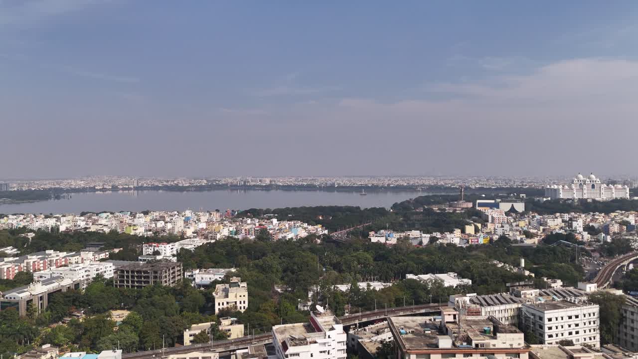Aerial view of the Hussain Sagar Lake in Hyderabad, the Telangana Secretariat and cinematic footage of Hyderabad's most famous area, Hussain Sagar Lake