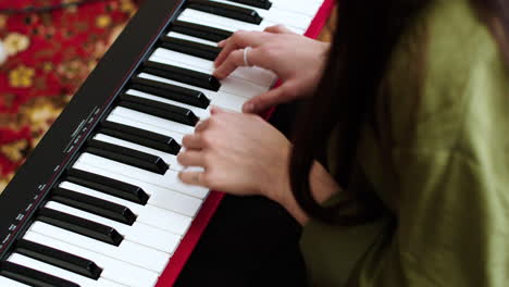 Girl-playing-music-at-home