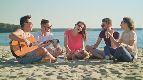 young people having fun on the beach