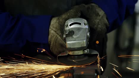 Welder-working-at-work-shop