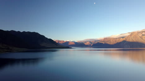 the beautiful lake hawea and the southern alps mountains in the south island of new zealand