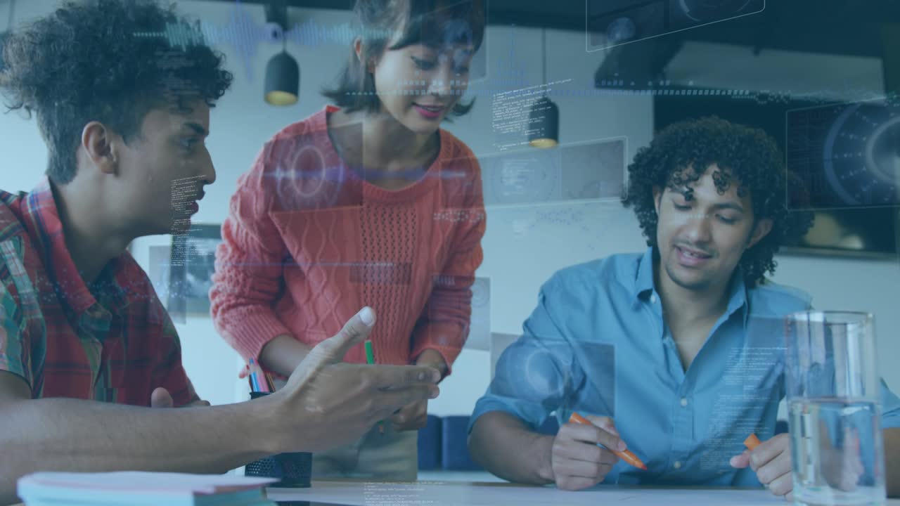 Design team around table left gesturing nudging right sketching orange marker HUD showing designs
