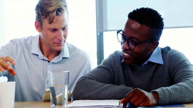 Executives discussing reports