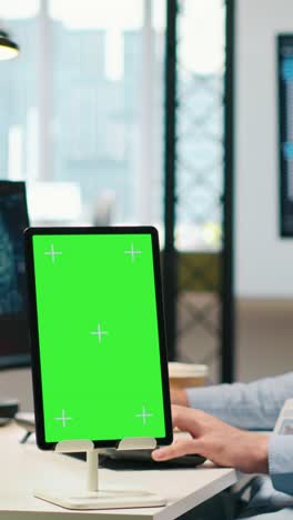 vertical video startup technician using isolated screen tablet, developing ai models