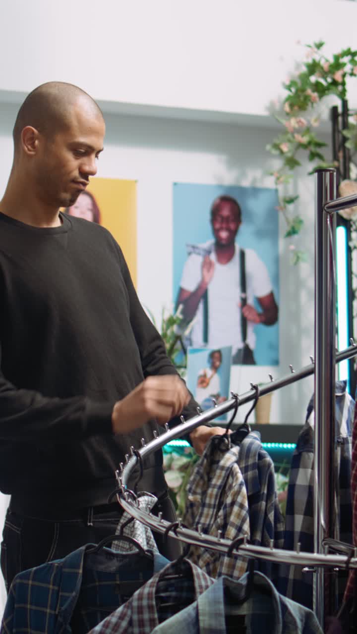 Clothing Store Scene with Man and Woman Posters