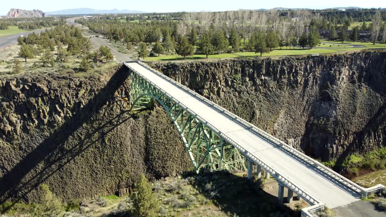 US, Oregon, Redmond, Crooked River High Bridge, 2025-04-12 - Drone view of the steel pedestrian bridge over the Crooked River at Highway 26 in spring in central Oregon