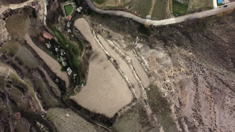 aerial view of terraced fields and rural landscape