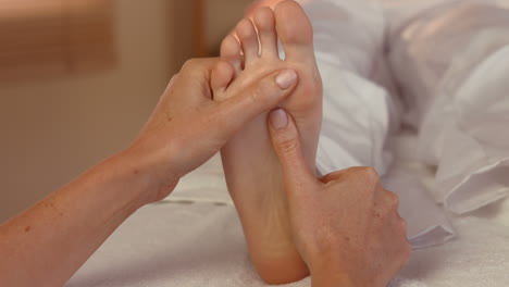 woman enjoying a foot massage