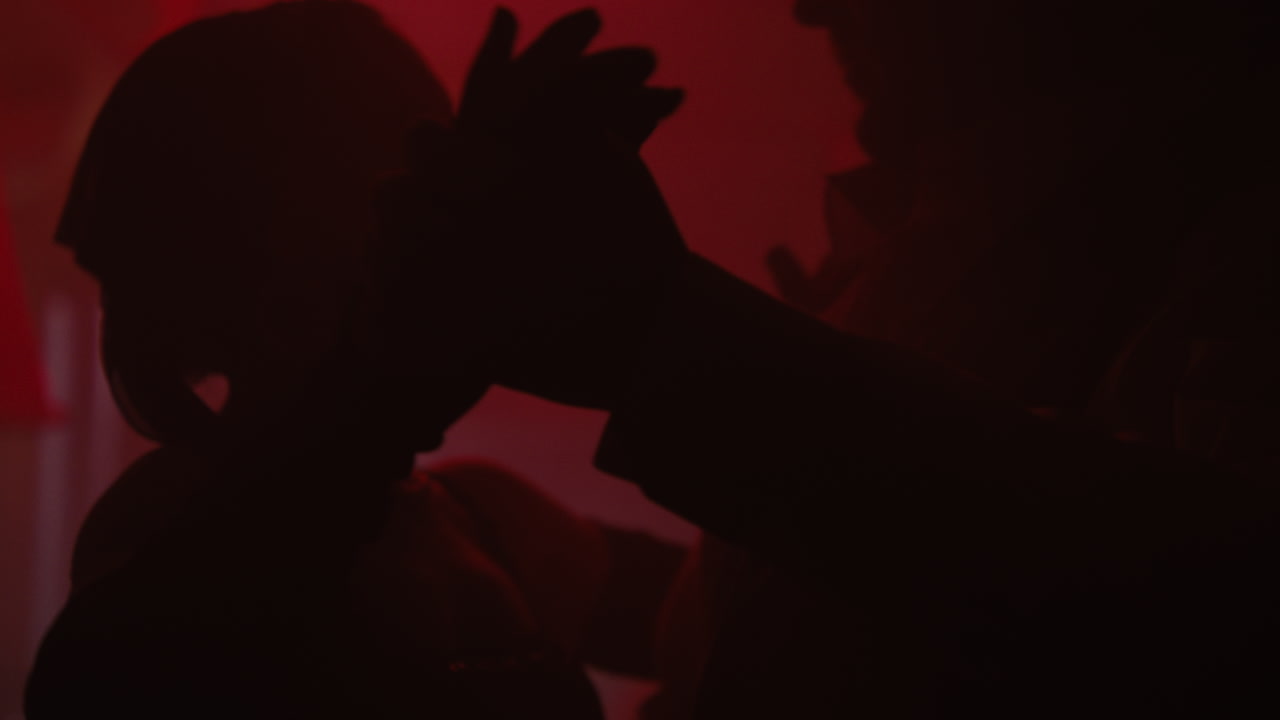 Silhouette Dance in Red Light