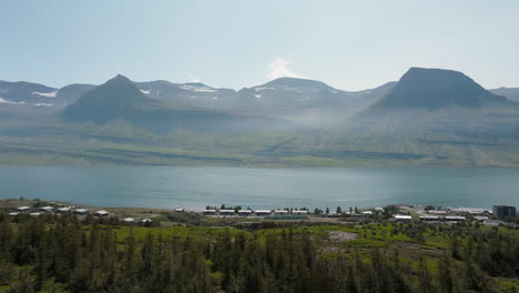 fjord landscape in iceland and mountains peninsula in summer, aerial pull out