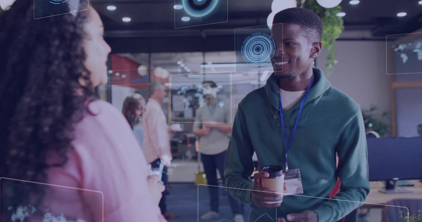 Coworkers conversing in office sparking digital UI overlays growing around them in technology demo
