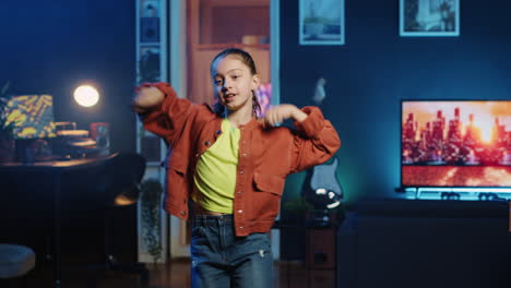 happy kid doing viral dance for social media platforms while listening to popular hit song