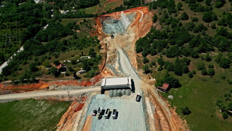 Dump-Trucks-At-Quarrying-Site-On-Sunny-Day