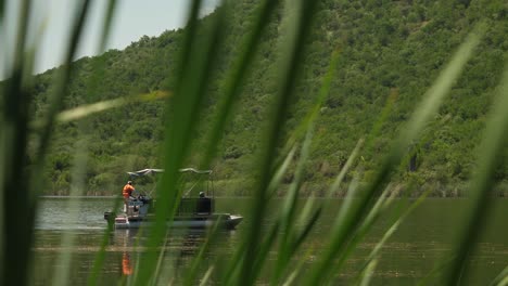 Close-shot-of-a-small-boat-on-a-pond-in-the-middle-of-South-Africa