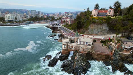 aerial view of a castle on a rocky coastline in vina del mar, chile