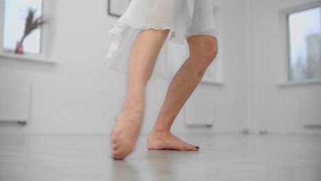 woman dancing ballet in a studio