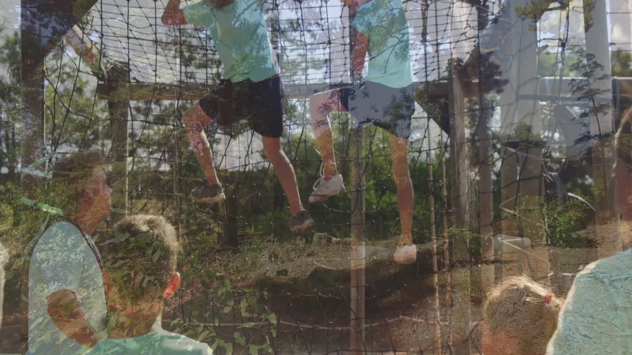 Climbing rope net in sunny park, children supervised by adult outdoors
