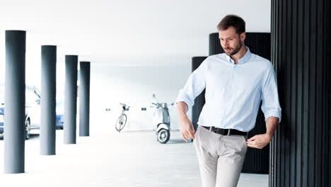 businessman in modern parking garage