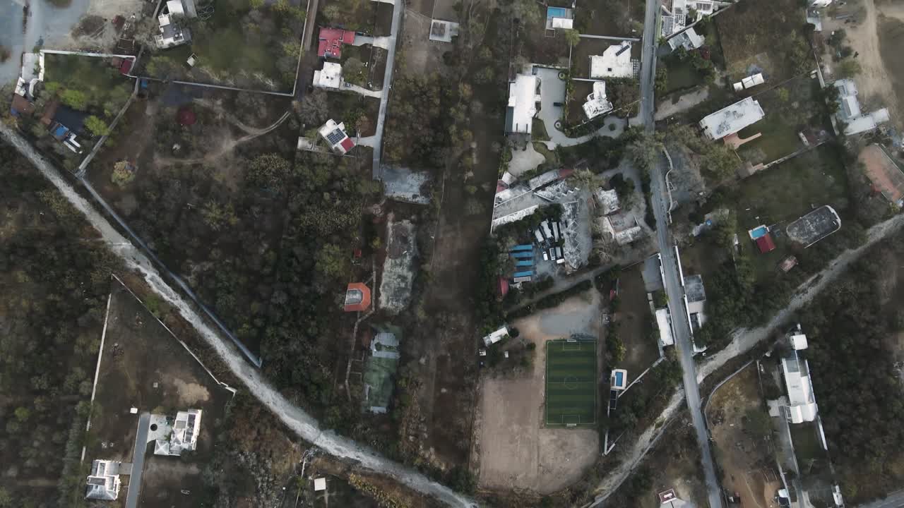 Top down drone shot of Monterrey, Mexico's worn down streets