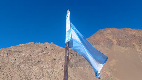 argentinian flag by punta de vacas, the starting point for one of the routes to aconcagua