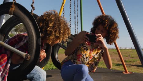 mother and son having fun at playground