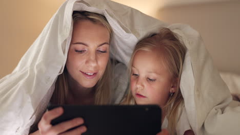 Tablet,-mother-and-girl-with-bedroom-blanket-fort