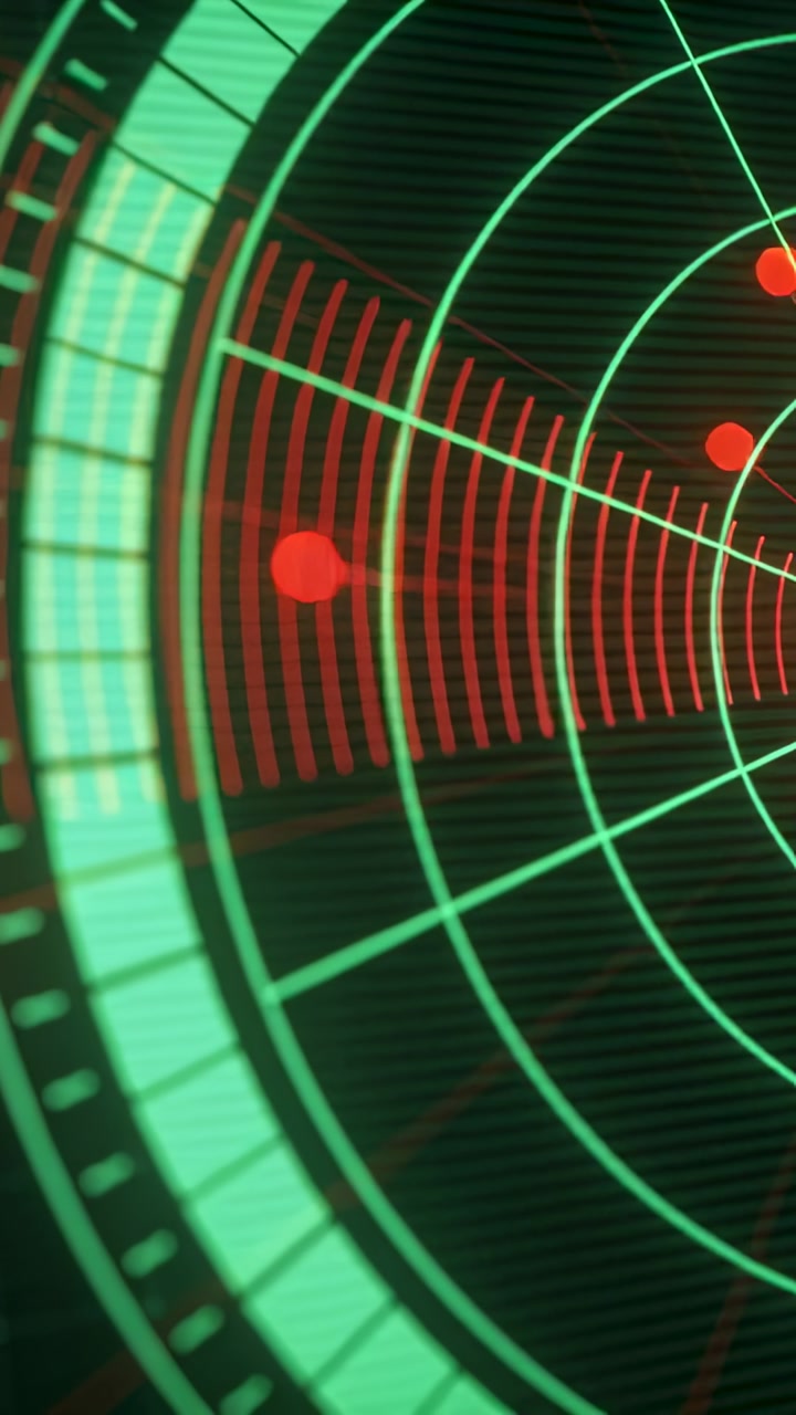 Vertical video: Rotating radar display scanning panel, tracking red blips, green rings, bezel