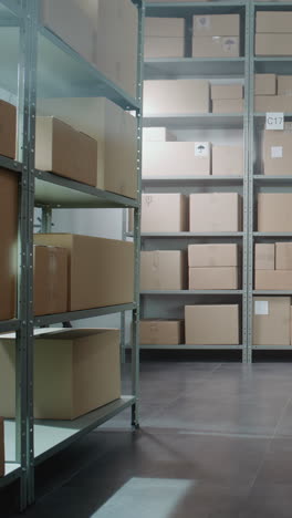 warehouse storage room with cardboard boxes on shelving