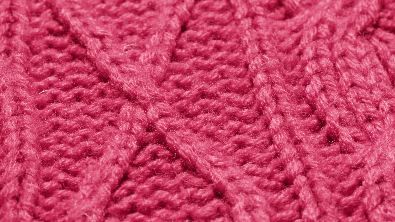 Close-up of a vibrant red knitted fabric