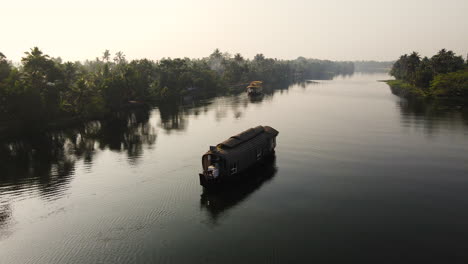 kerala houseboat tour during sunrise in alleppey, kerala, india