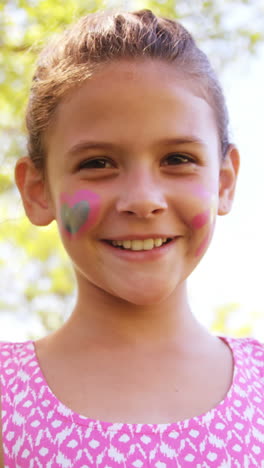 cute girl smiling in park