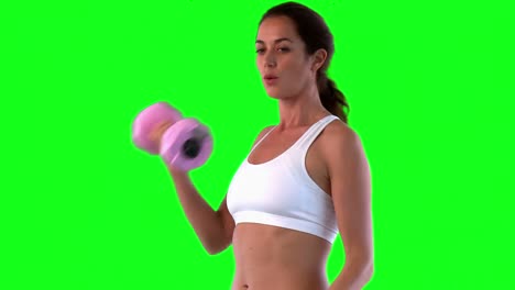 mujer atlética haciendo ejercicio con pesas
