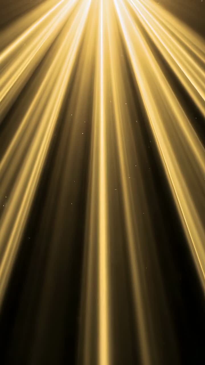 Vertical video: Starting golden light beams growing in dark void, with floating dust particles