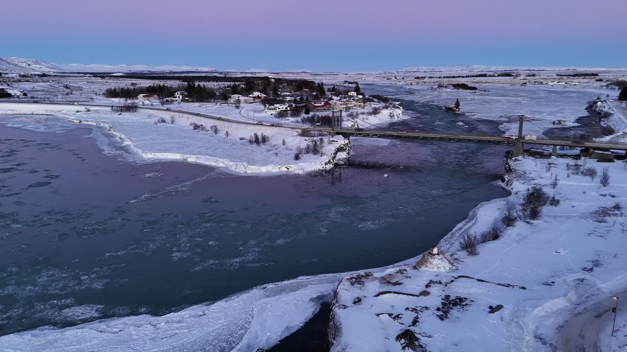 Icy Waters Of Olfusa River In Selfoss Town During Winter In South Iceland. Aerial Drone Shot