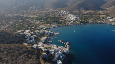 ferries and yachts anchored in katapola port, amorgos, iconic mediterranean tourism spot, greece