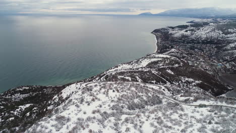 snowy mountain coastline aerial view