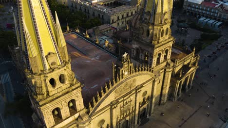 fixed birds eye aerial view of people walking in front of guadalajara cathedral